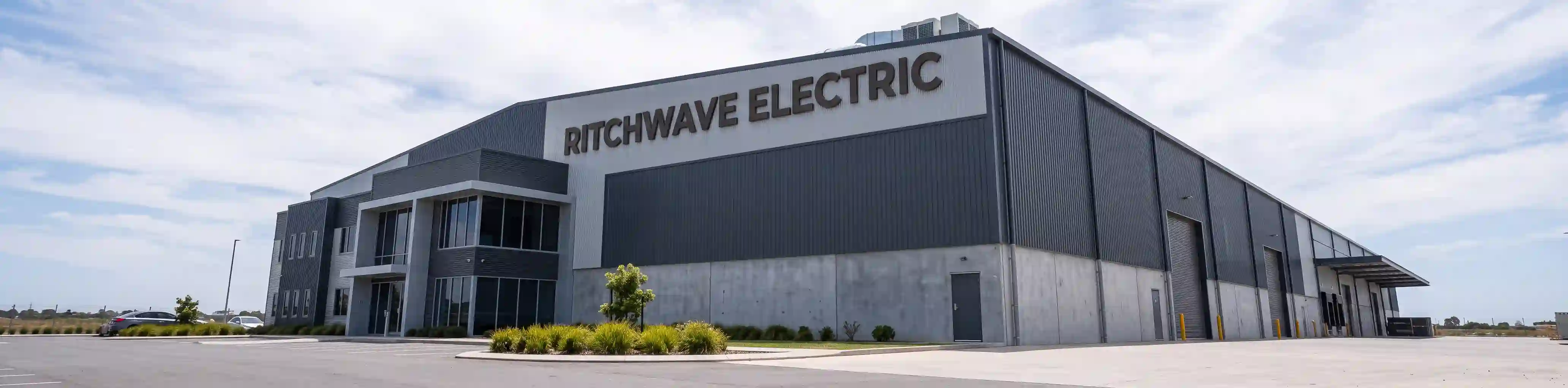 Industrial building exterior with Ritchwave Electric signage