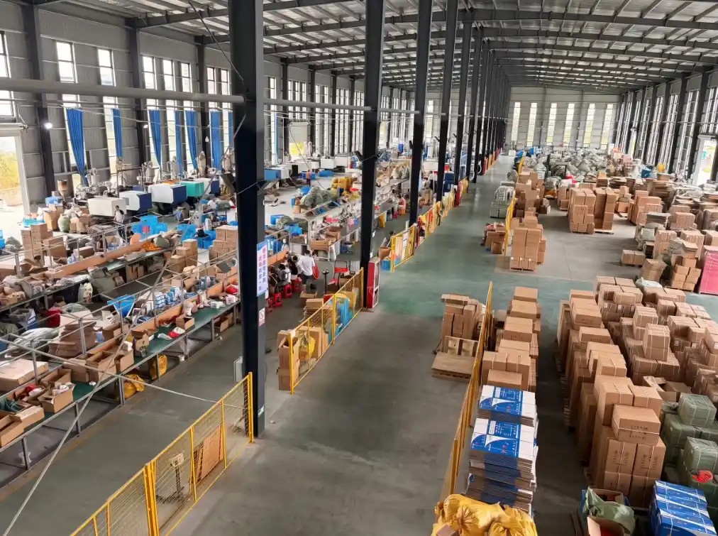 Workshop overview with production equipment, workstations and boxed goods
